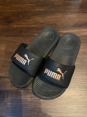 Puma Black Slides with Rose Gold Logo Accents